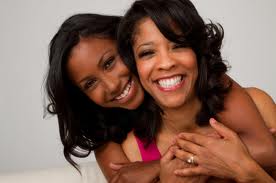 Mother & Daughter. courtesy of Madame Noire via Madamenoire.com
